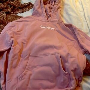 Glossier pink sweatshirt